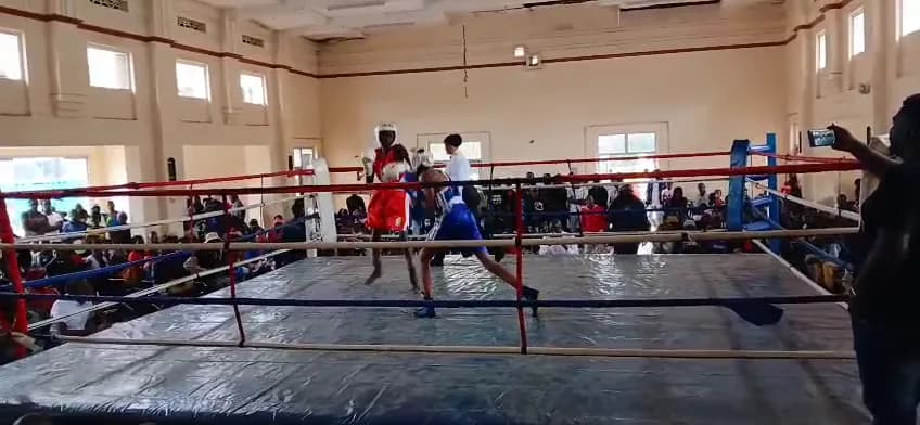 Boxers Fighting in the Ring