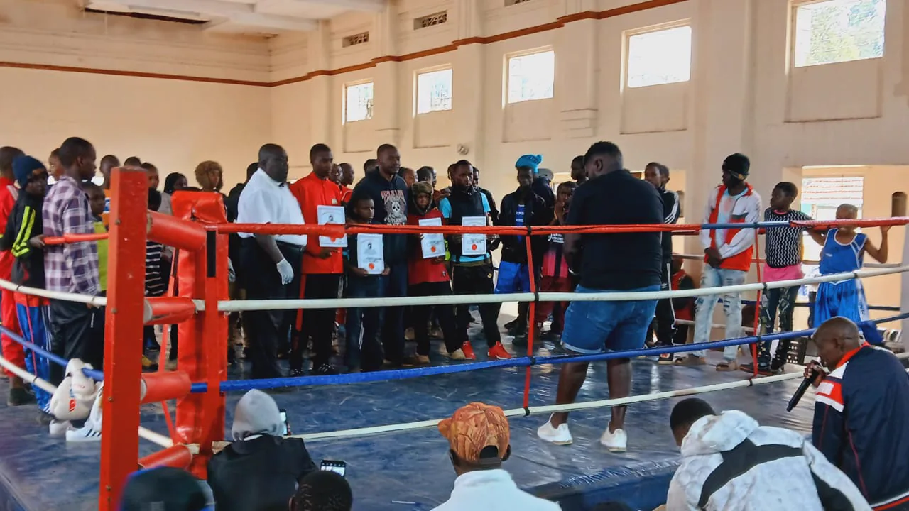 ORTBC boxers in the ring with certificates after the tournament